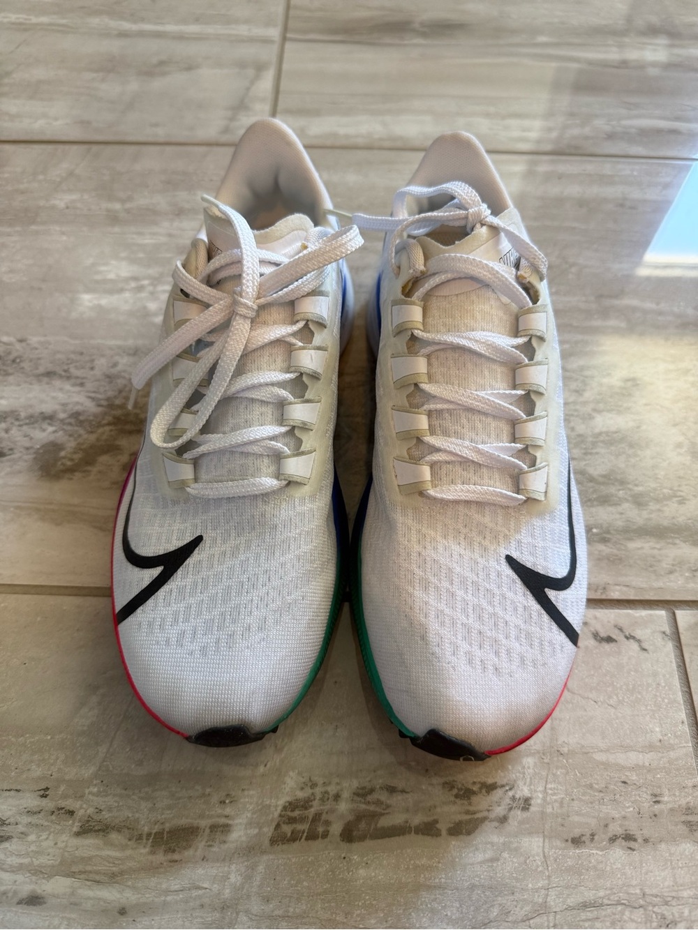 Nike White Running Shoes with Multi-Color Sole